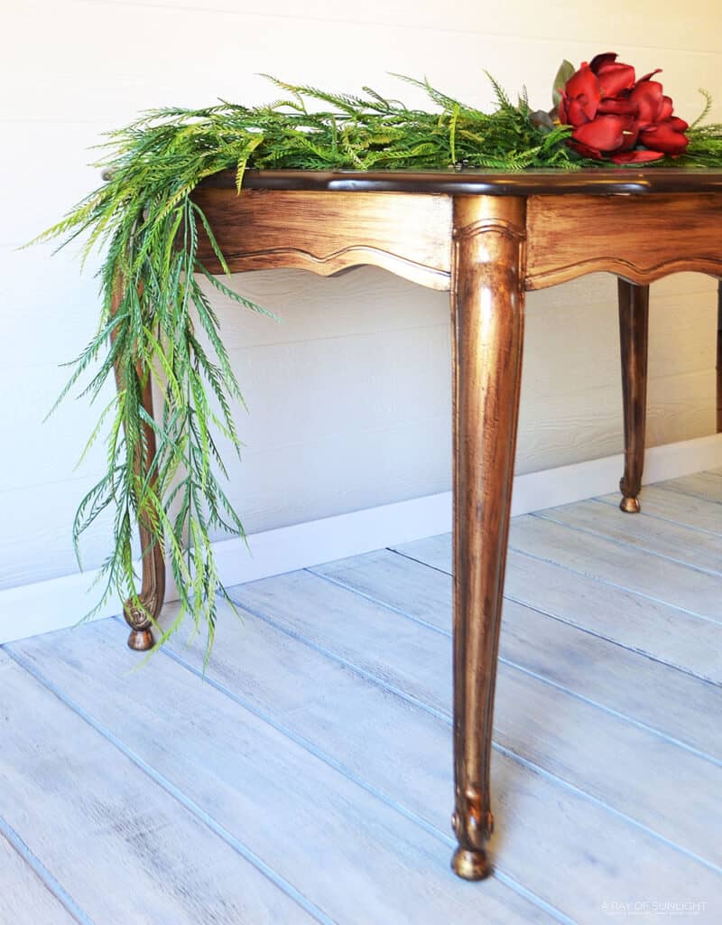 side angle of the antique gold painted dining table