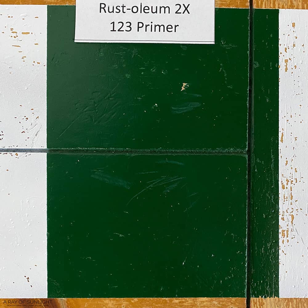 Rust-oleum 2X paint with 123 Primer scratched down to the wood in some spots. 