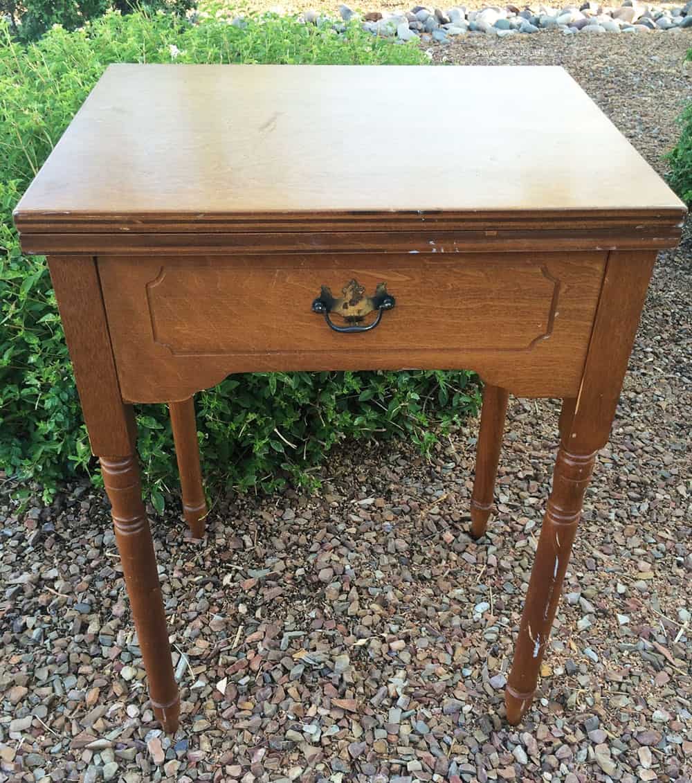 an old sewing machine table