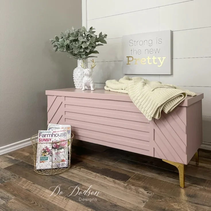 Pink painted cedar chest with wood trim