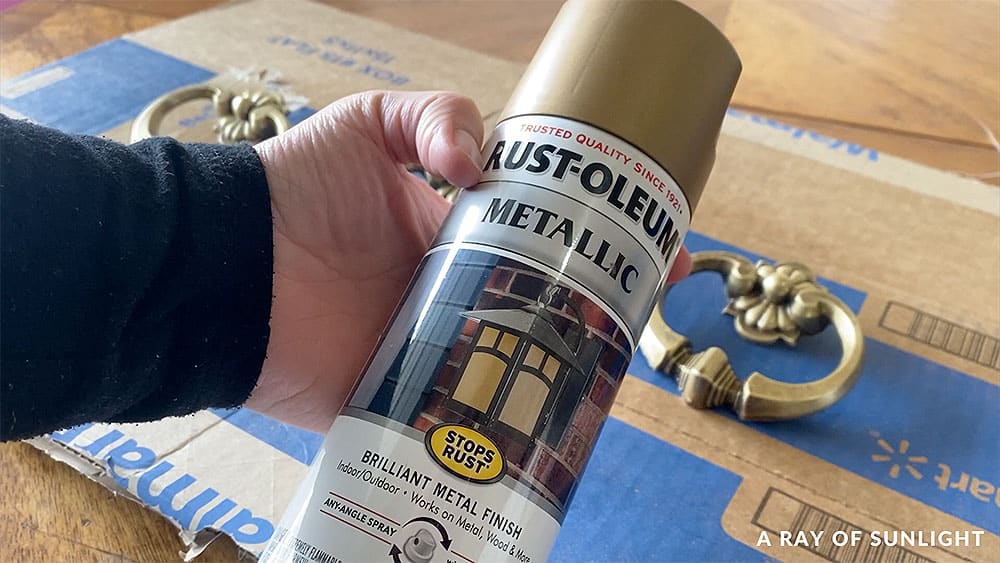 Bottle of Rust-oleum metallic gold spray paint for hardware