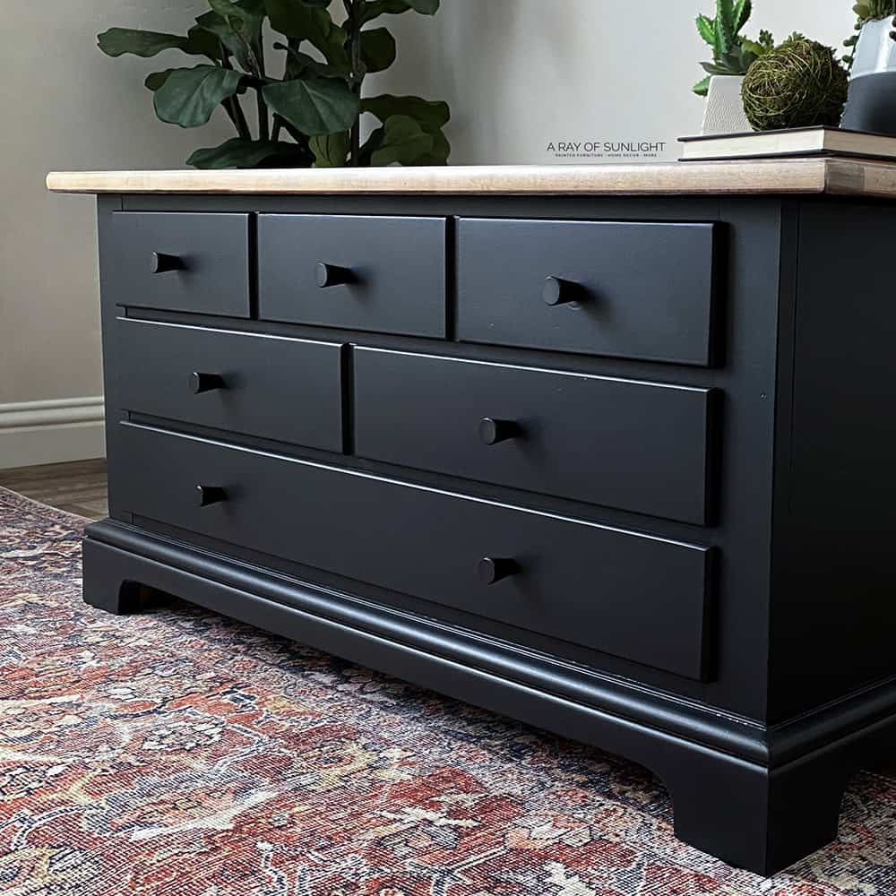 black painted coffee table with new black modern knobs on the card catalog style drawers