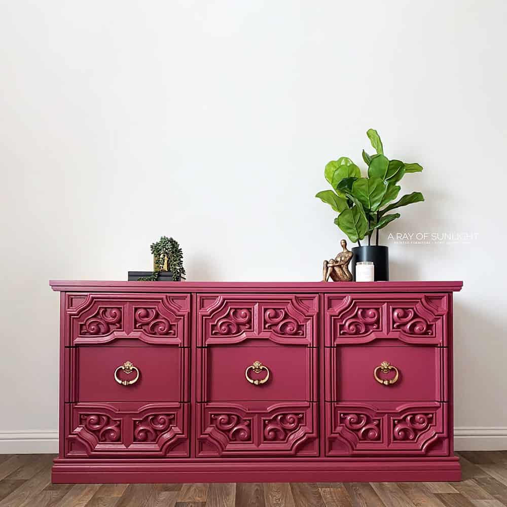 Pink painted dresser with gold hardware