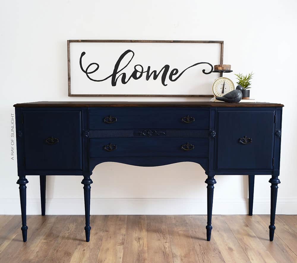 full shot of the blue antique painted buffet with farmhouse decorations