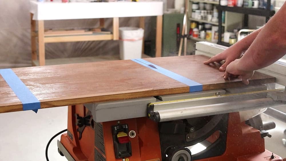 Cutting the top of the desk with a table saw