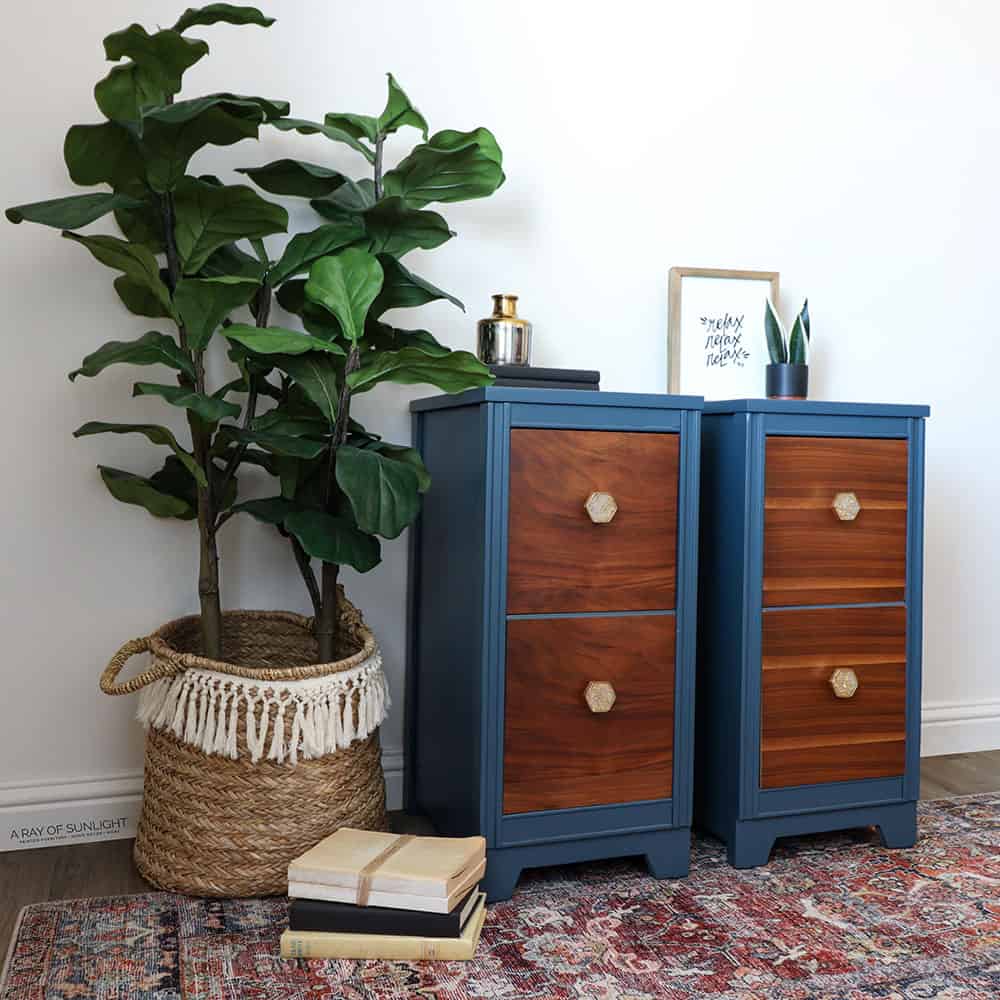 Side view of mid century modern nightstands painted in blue chalk paint.