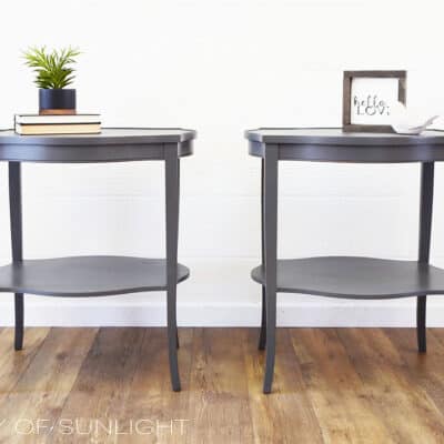 gray painted oval end tables with a shelf
