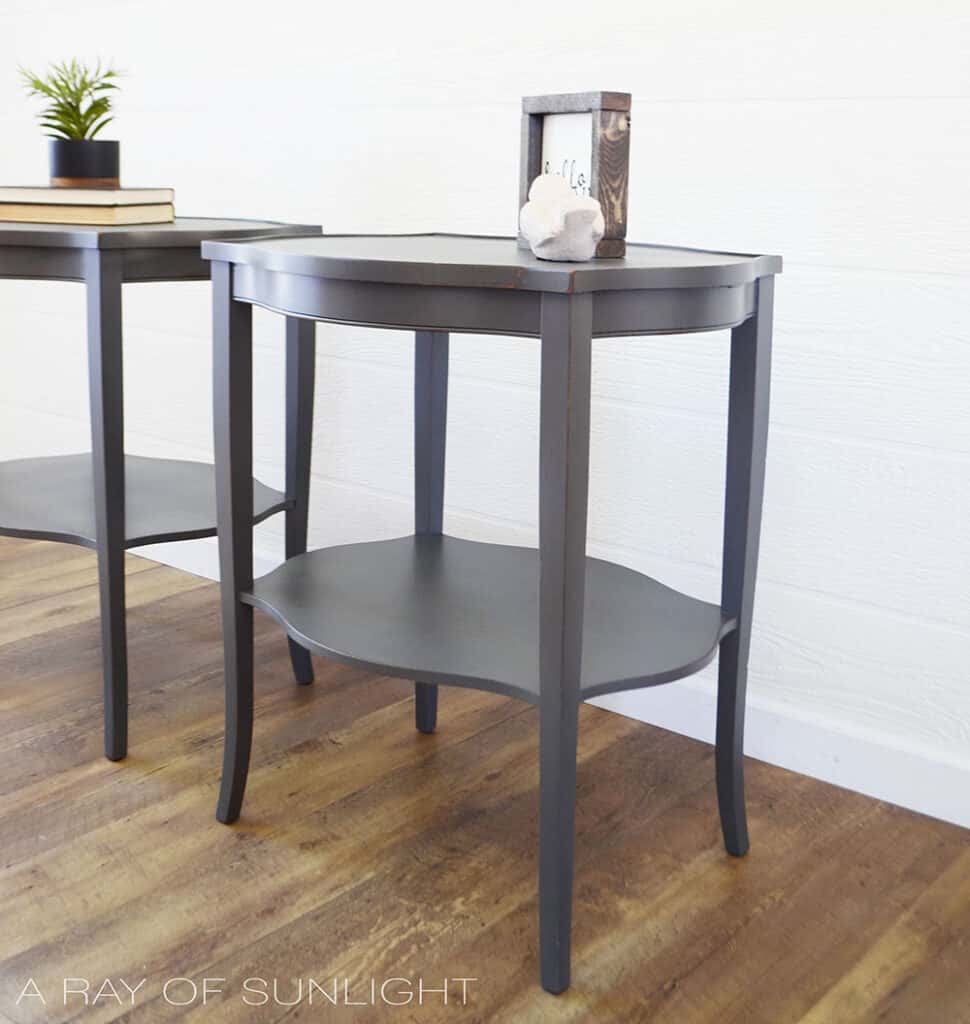 side view of chalk painted gray end tables