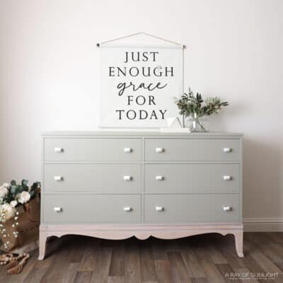 green painted diy dresser makeover with white knobs