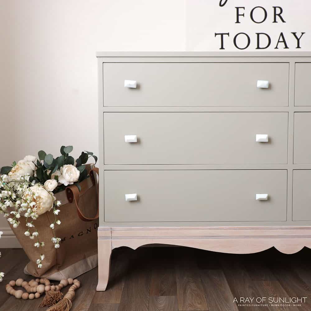 Dresser painted with Melange ONE in Knapsack with a whitewashed base and white knobs.