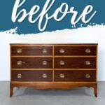 A vintage wooden dresser with six drawers and brass handles, labeled before at the top.