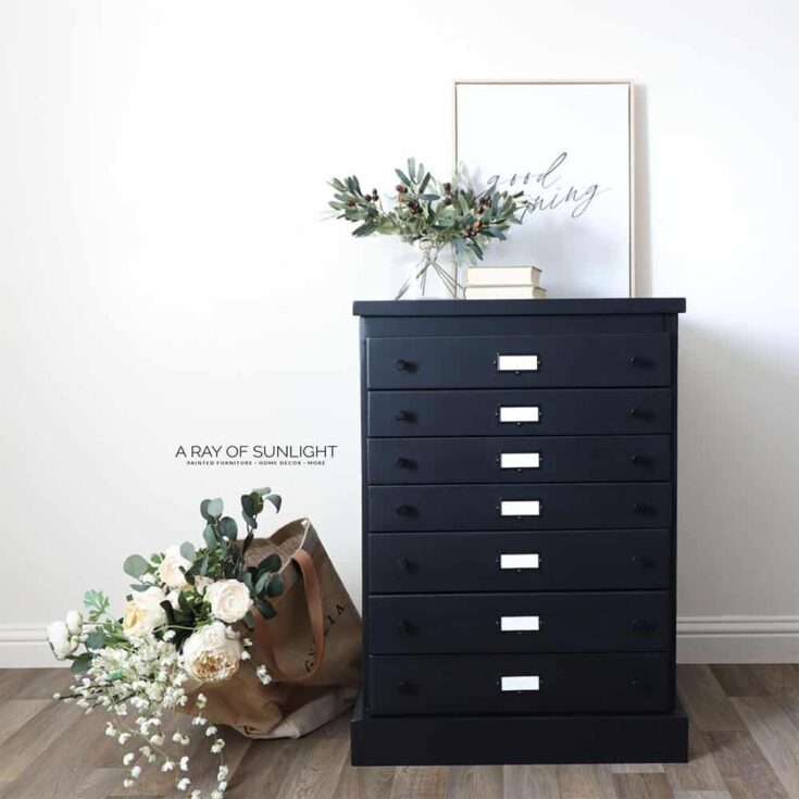 Repainted black flat file cabinet with black hardware.
