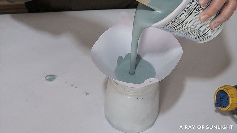 Pouring and thinning Fusion Mineral Paint into a paint sprayer