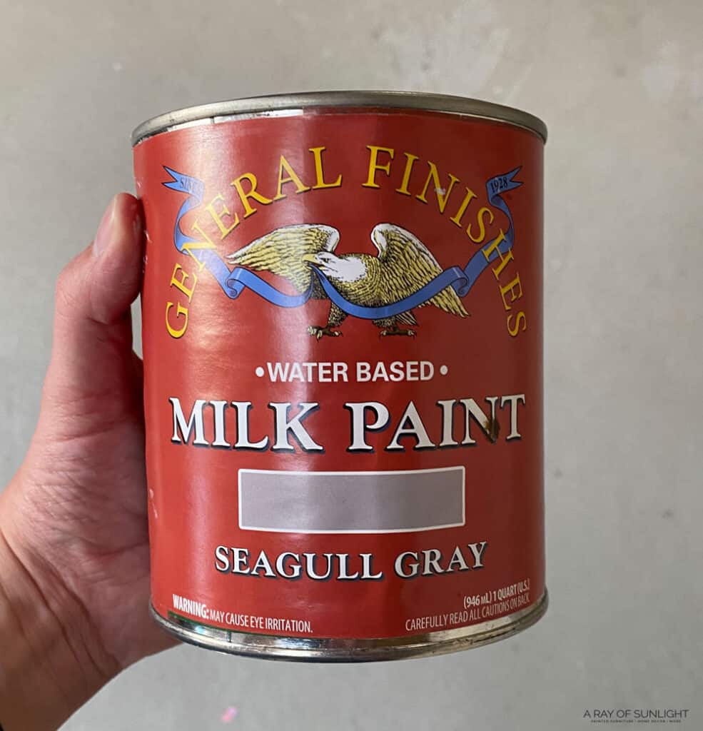 can of general finishes milk paint in seagull gray