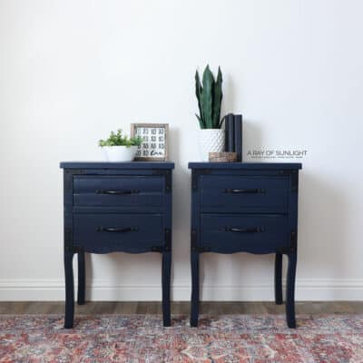 Dark navy blue nightstands painted with latex paint.