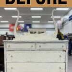 White vintage dresser with a mirror in a thrift store, labeled BEFORE at the top.