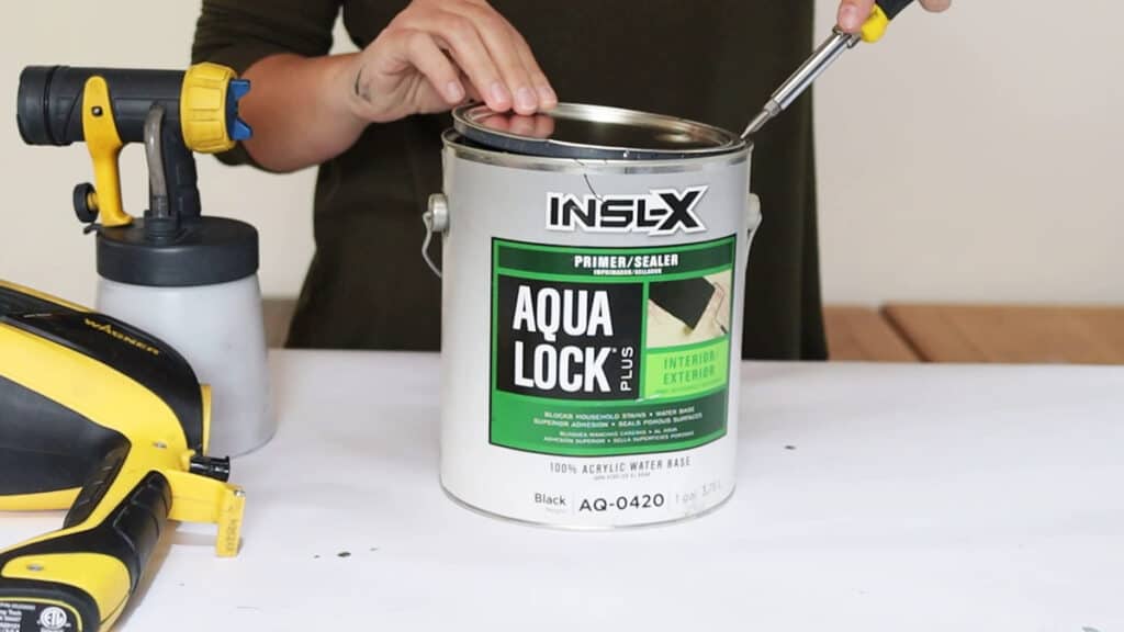 opening can of Aqua Lock primer