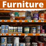 Shelves stocked with various paint primer cans in a home improvement store, labeled as best primers for furniture.