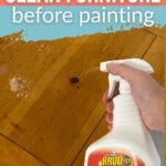 Hand holding a Krud Kutter spray bottle over a wooden table with cleaning bubbles; text above reads cleaning tips.
