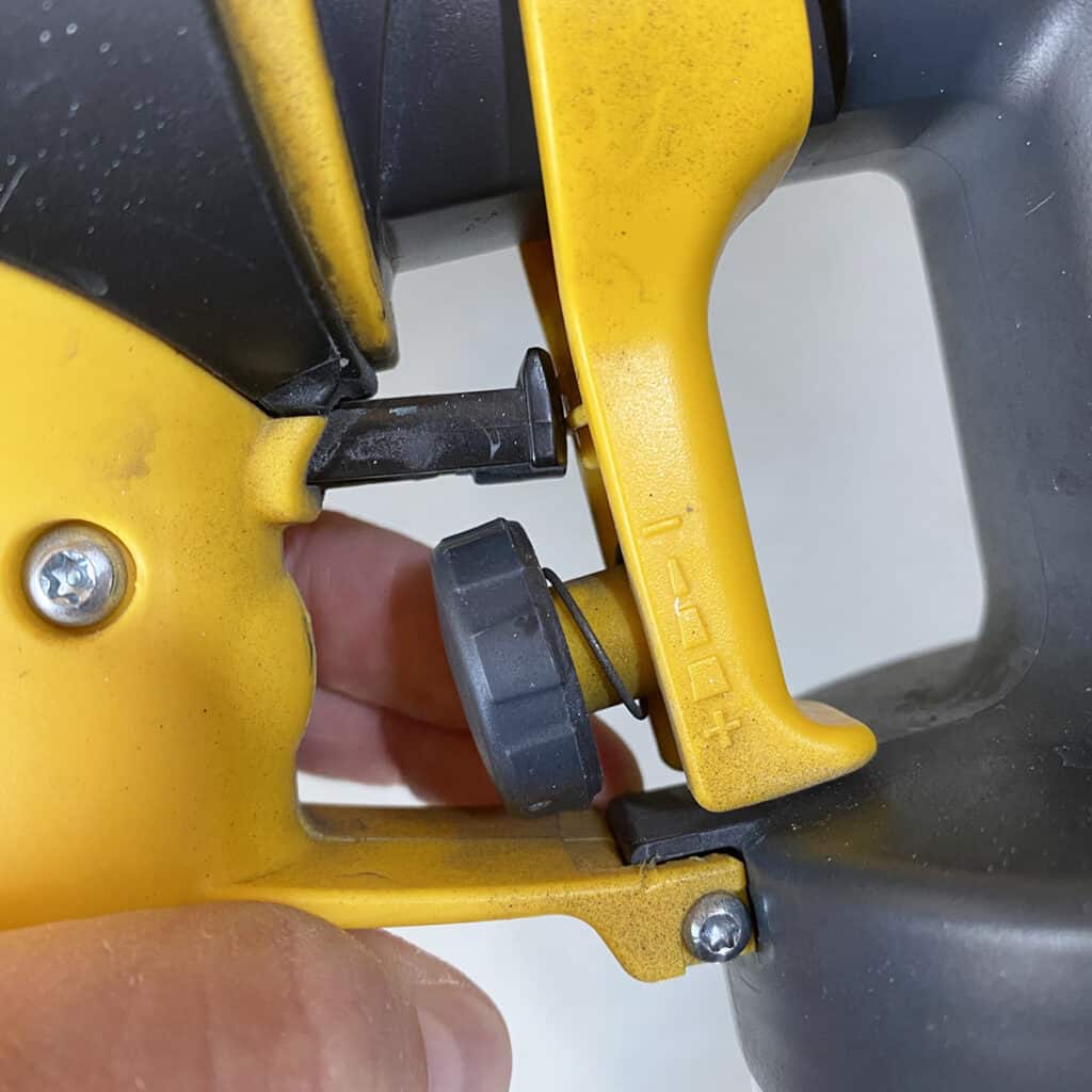 closeup of material flow adjustment knob