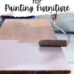 A paint roller applies light paint to a wooden surface; text reads Best rollers for painting furniture.