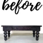 A dark wooden coffee table with turned legs and a drawer, with before written above in cursive text.