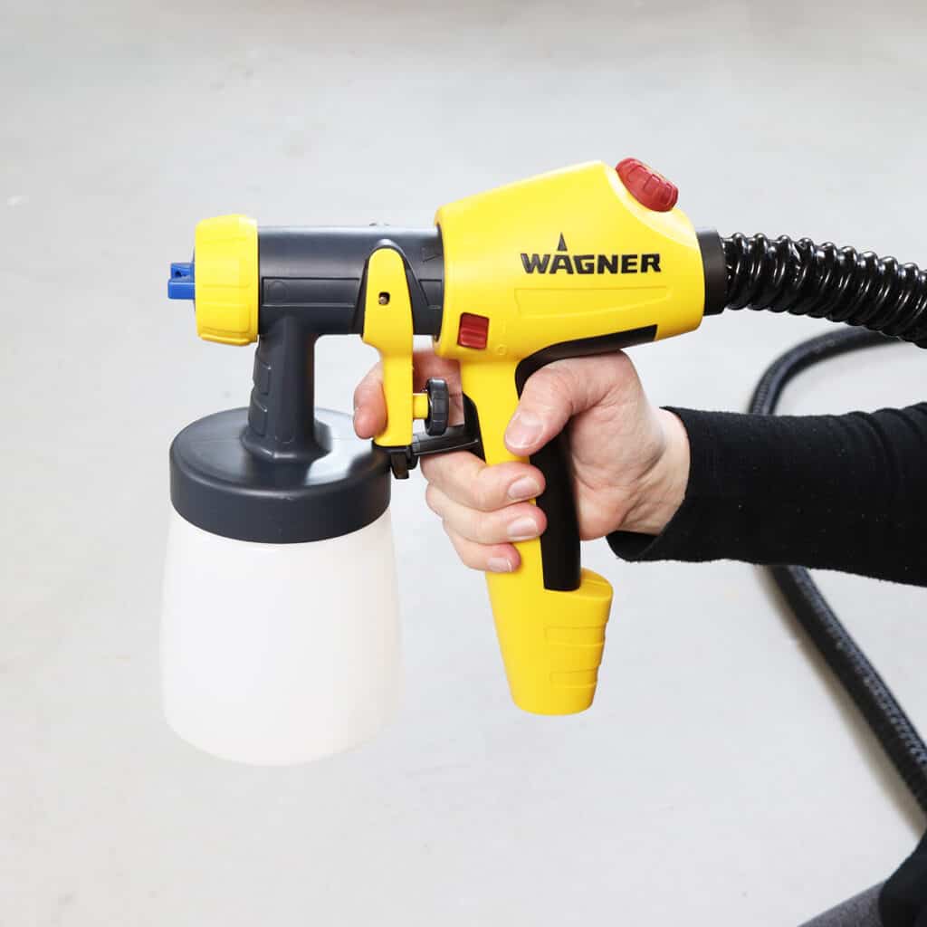 handheld wagner flexio 5000 paint sprayer with the detail finish nozzle