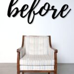 Vintage wooden armchair with striped upholstery fabric