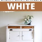 White painted buffet with black handles and oak grain