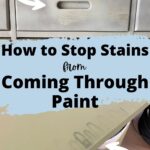 arrow pointing the stains coming through paint