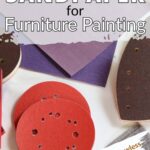 Various types of sandpaper and sanding pads arranged on a white surface with text about furniture painting.