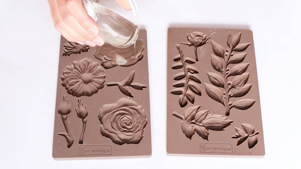 pouring casting resin onto a flower mold