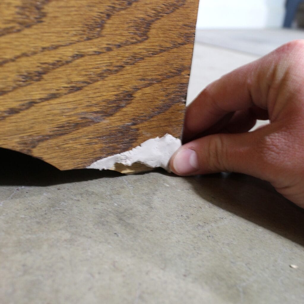filling in chipped wood with wood filler