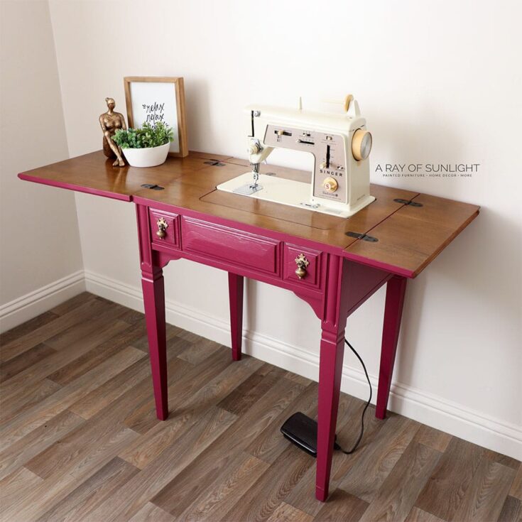 pink painted sewing machine table with vintage sewing machine