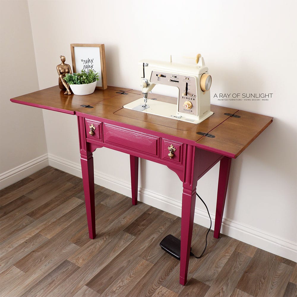 pink painted sewing table with singer sewing machine