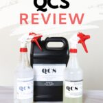 Three QCS cleaning product bottles with red spray tops, labeled STRIPWELL QCS REVIEW above them.