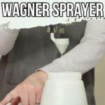 A person pours thinned paint into a container for a Wagner sprayer, following instructions.