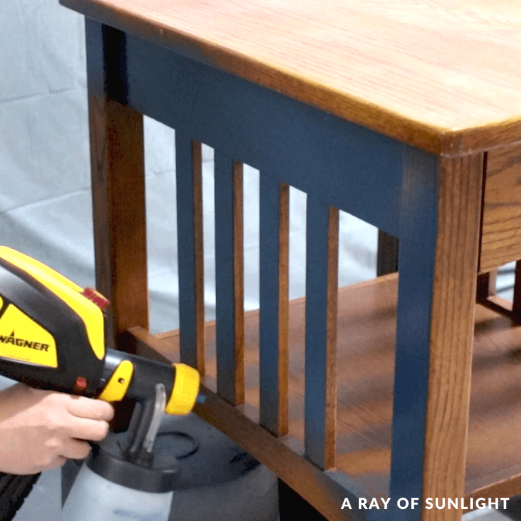 painting the table using Wagner paint sprayer