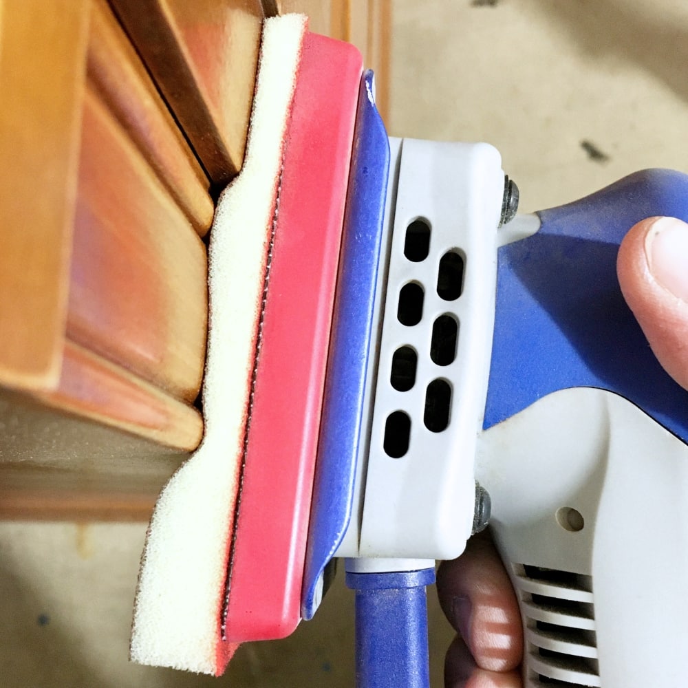 closeup of a surfprep sander with foam pad to sand detailed wood