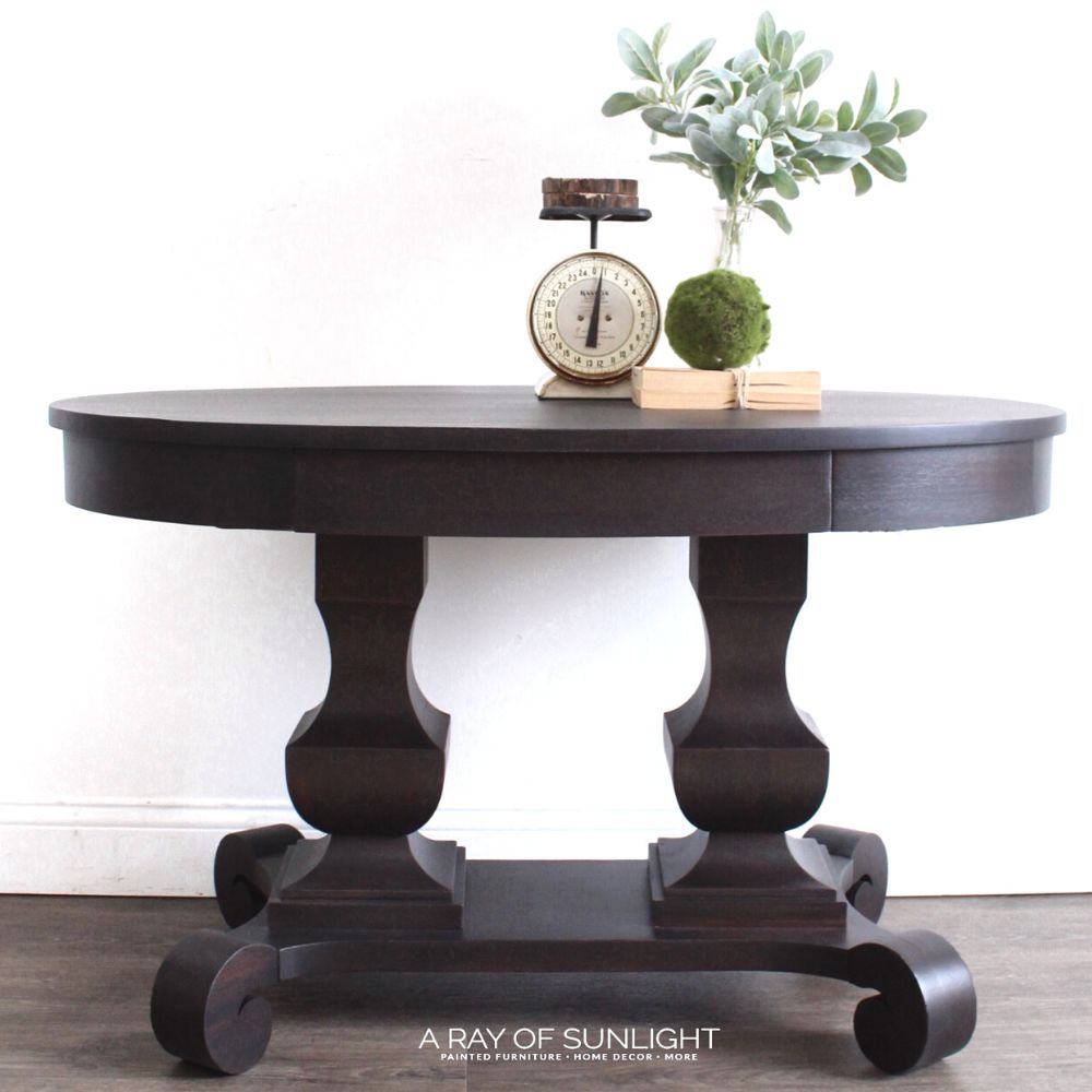 stained wood table with black paint