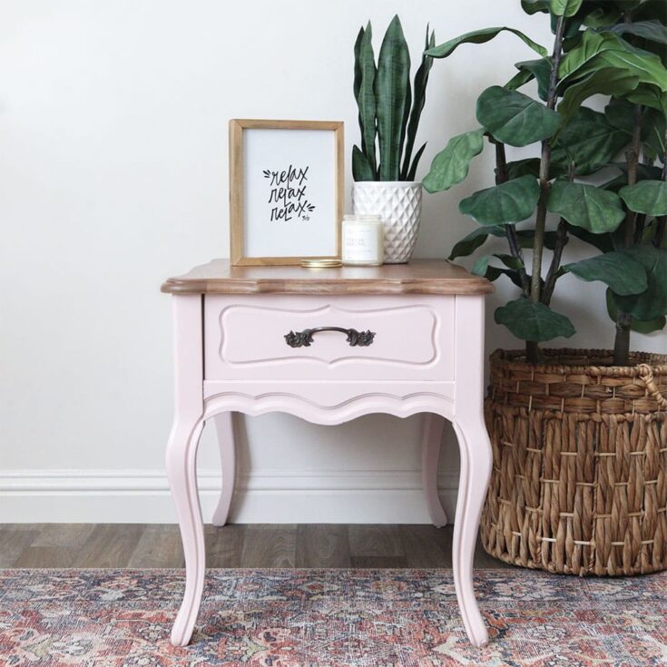 pink painted nightstand with wood stained top