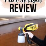 Person holding a yellow Wagner 3500 paint sprayer near a brown wooden dresser, review text above.