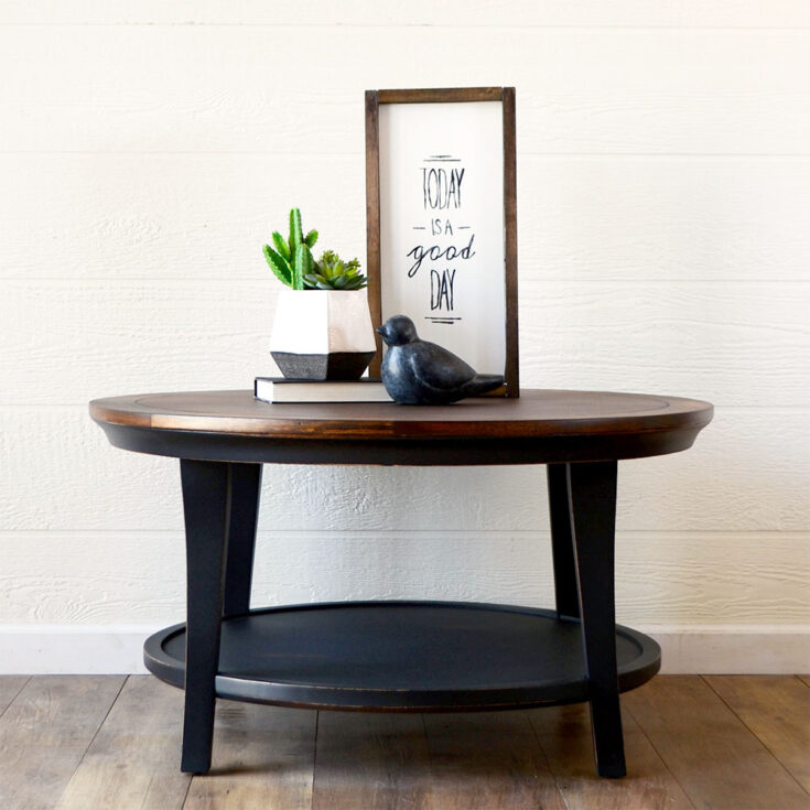 black painted coffee table with dark stained wood top