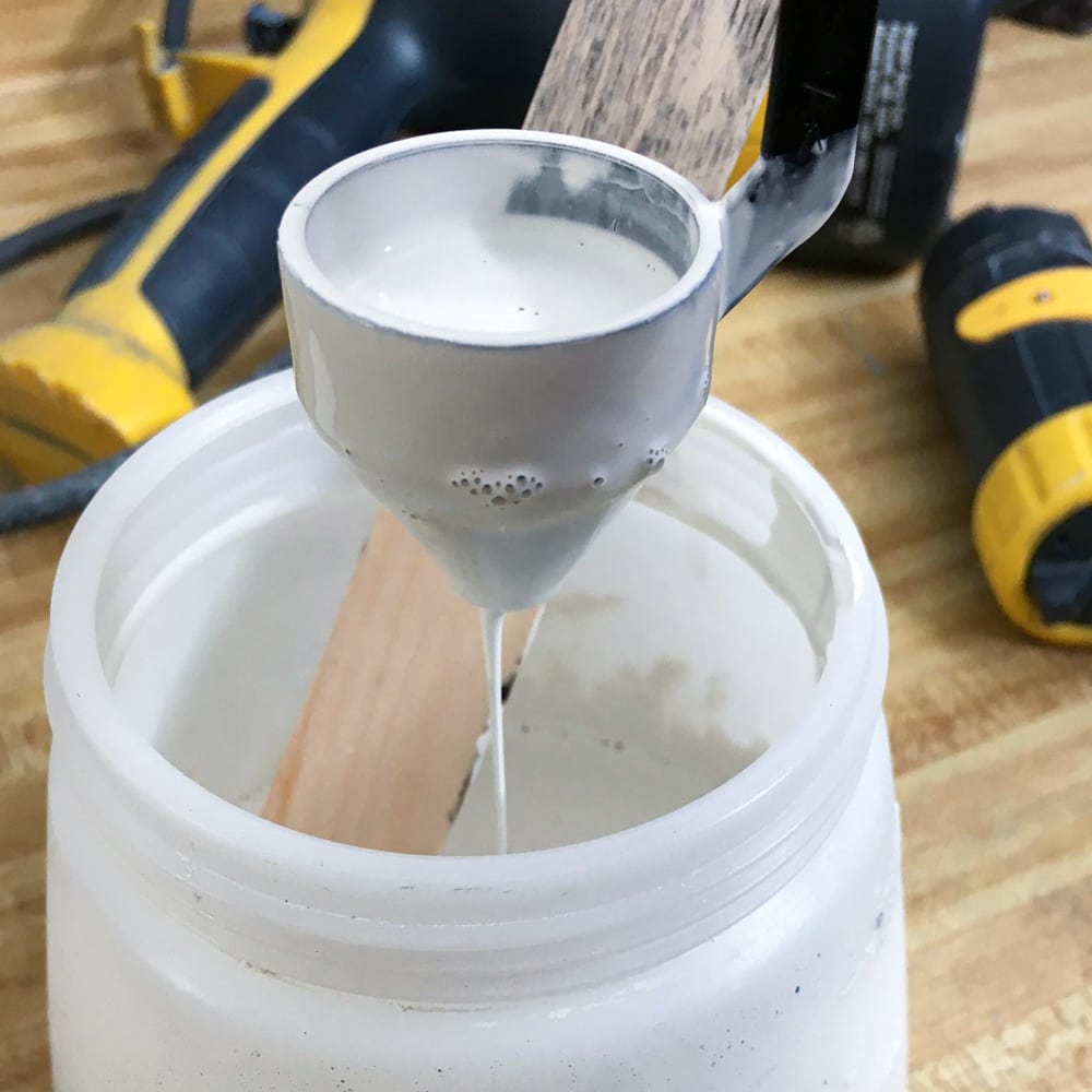 using a viscosity cup to find the right thickness of paint