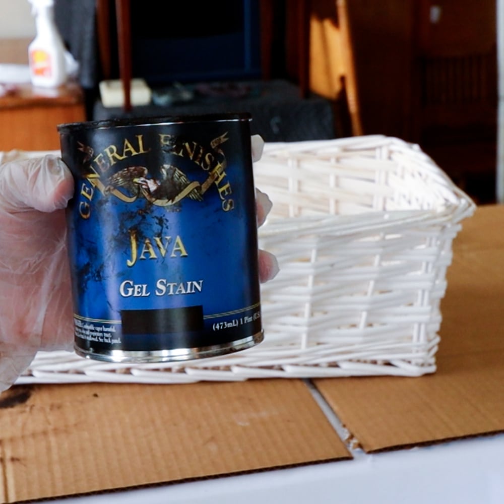 photo of gel stain in a can and white basket to  stain.
