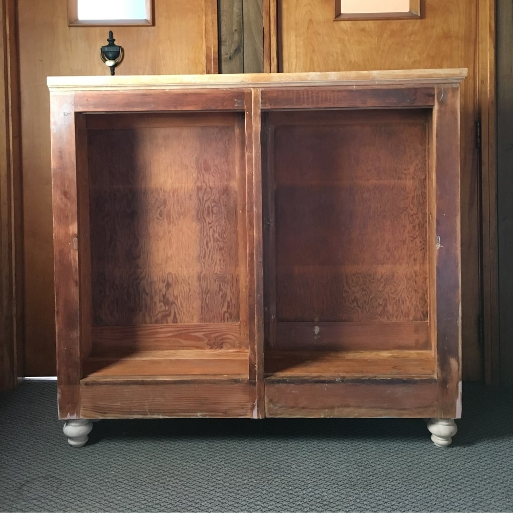 Wood cabinet with new legs attached