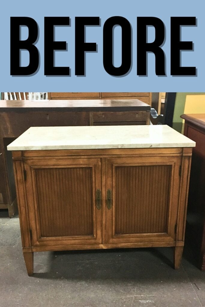 cabinet with marble top and 2 doors