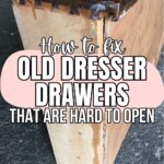 A worn wooden dresser drawer with peeling veneer and text about fixing drawers that are hard to open.
