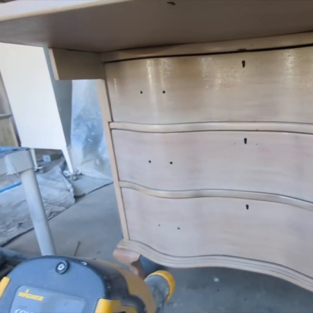 spraying topcoat with wagner paint sprayer