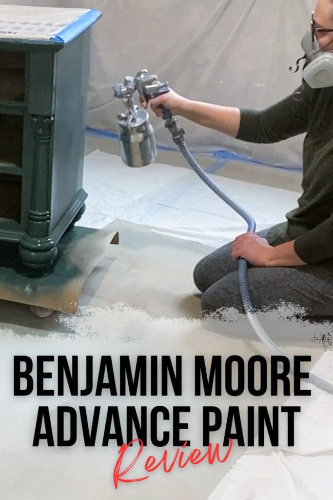 spraying Benjamin Moore Advance paint onto furniture